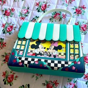 Lightly used Disney loungefly purse.